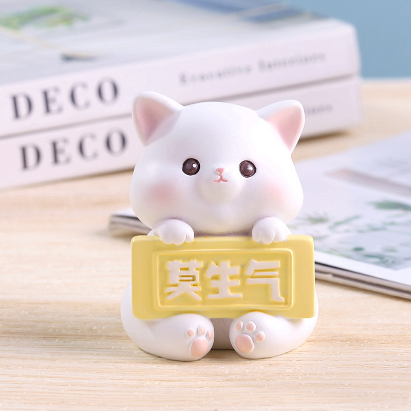 작고 귀여운 고양이 장식품