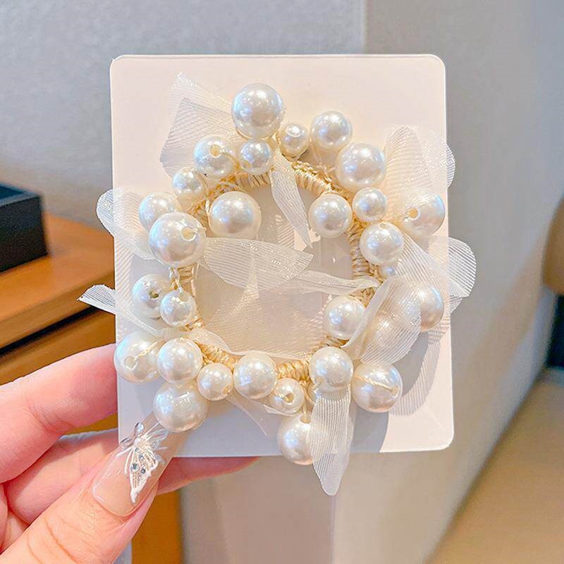 Moda nueva alta sensación de cabello de perla nueva línea de cabello de alta gama de cabello de cabello de mujer bola de cabello anillo de cabello flores