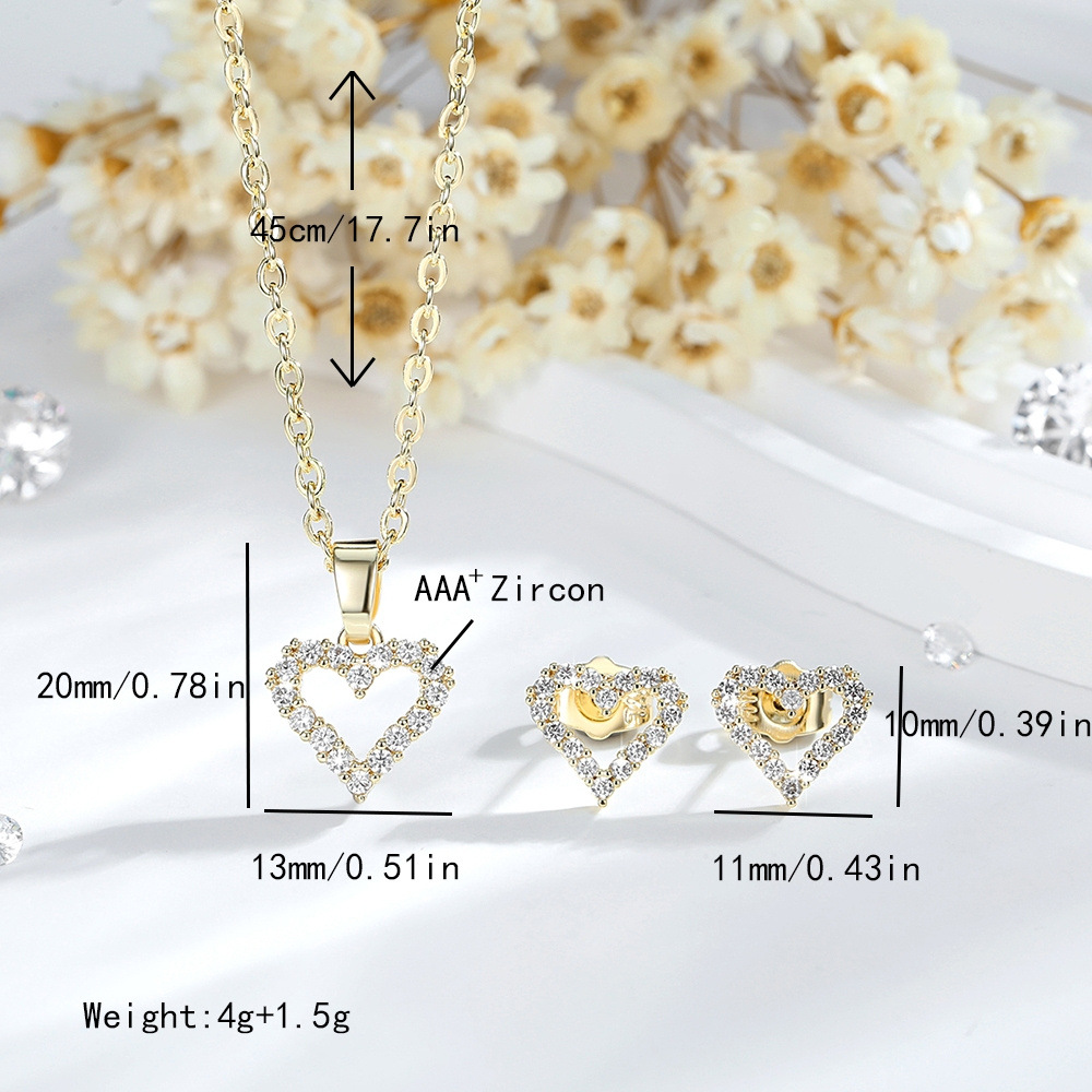 Ventas transfronterizas calientes de cobre 14K oro color amor collar pendientes de zircón corazón europeo y americano colgante conjunto de joyas mujeres