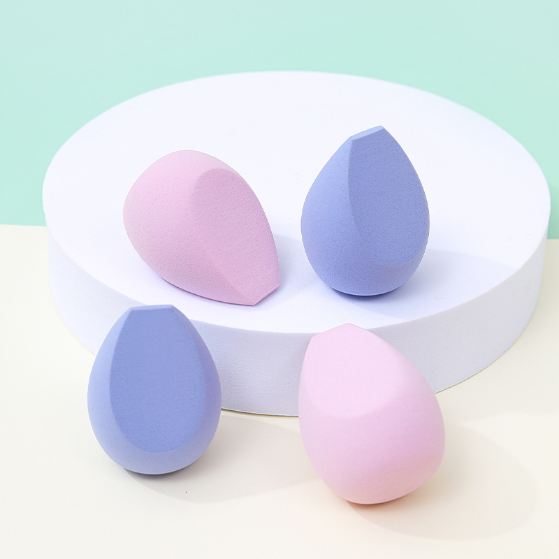 Fábrica personalizada de huevo de maquillaje de tres cuchillos polvo de maquillaje no comer polvo de maquillaje de doble uso esponja de maquillaje huevo de maquillaje al por mayor transfronterizo