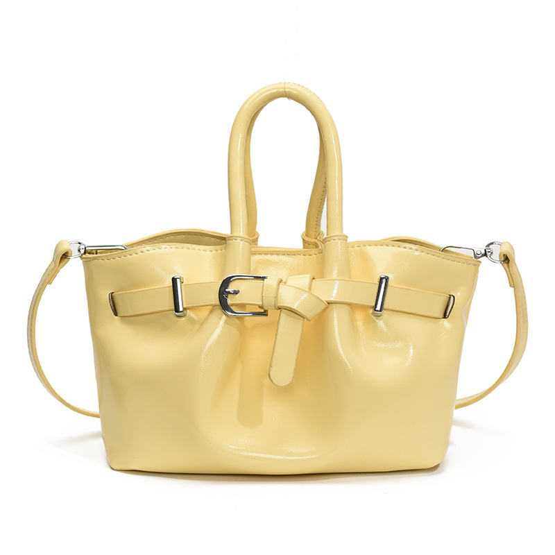 Bolsa de cubo de moda coreana 2025, nueva bolsa de hombro de moda nicho, alta sensación, bolsa de hombro de mujer.