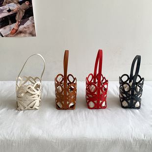 Women's Bag New Korean Cut Out Drawstring Canvas Cylinder Bucket Bag Niche Design High-End Shoulder Bag for Women