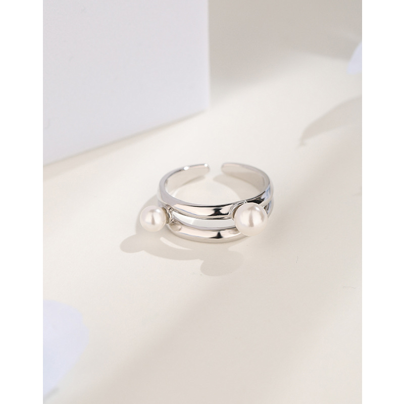 Anillo de perlas de plata esterlina 925 Luz de las mujeres nicho de lujo diseño avanzado anillo de cola ajustable abierto anillo de dedo índice