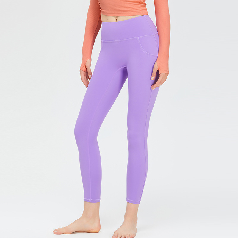 Nueva ropa de Yoga de las mujeres de Bolsillo falso elástico de la cadera melocotón pantalones de alta elástica Pantalones deportivos desnuda sensación sin T-line pantalones de yoga