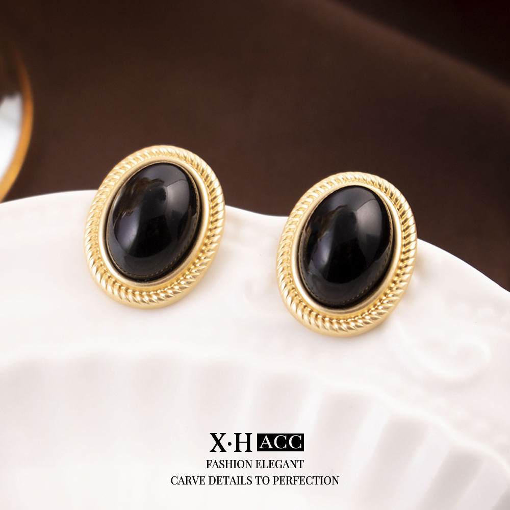 French de alta gama sin orejas pinzas para orejas de temperamento simple femenino pinzas para orejas triangulares de lujo ligero sin orejas pendientes Yiwu al por mayor