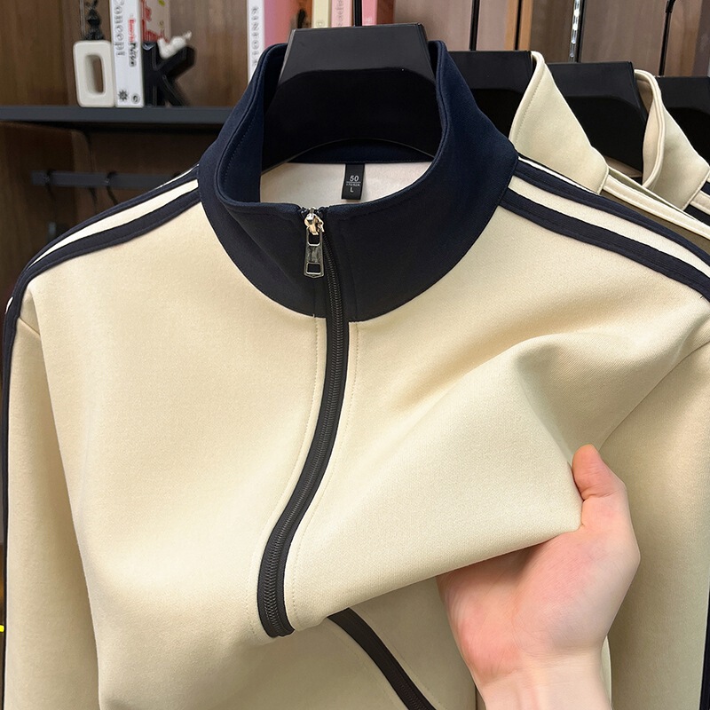 European-style trendy and age-reducing autumn and winter new cotton long-sleeve jacket for men, loose and warm, with stand-up collar and color-blocking design European-style trendy and age-reducing autumn and winter new cotton long-sleeve jacket for men, loose and warm, with stand-up collar and color-blocking design