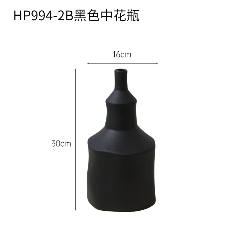 Viento tranquilo de cerámica blanca y negra ornamentos decorativos para la sala de estar decorativos para el hogar flor seca flor de escritorio