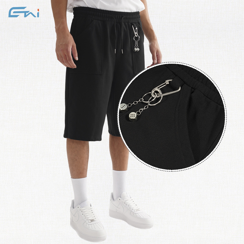 Pantalones cortos casuales de rodilla de alta calidad, pantalones cortos de hombre sueltos, pantalones de moda juveniles de siete puntos.