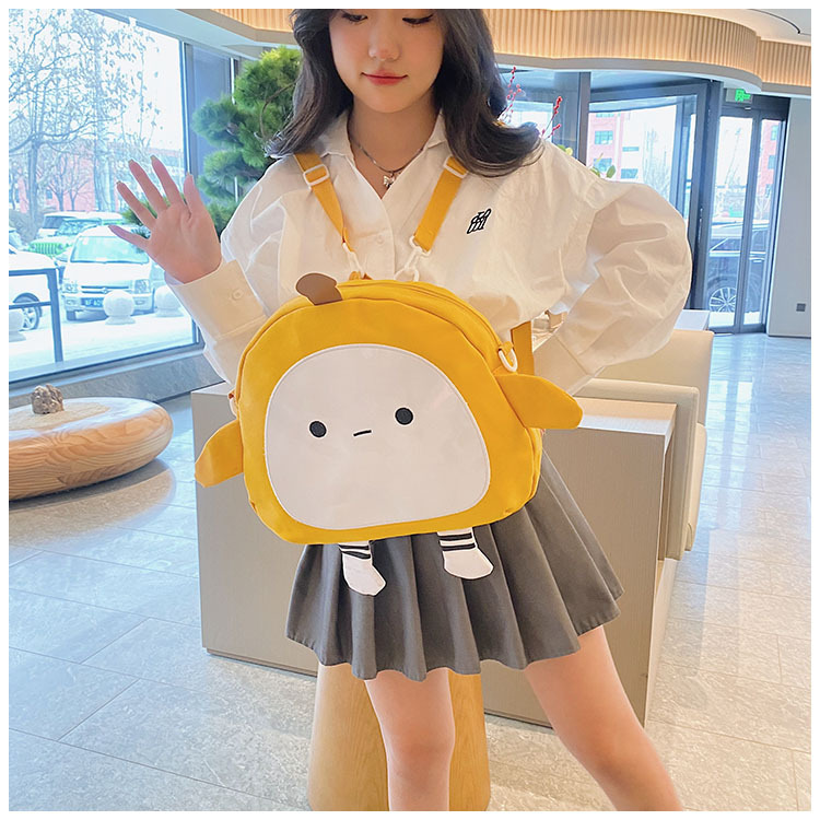 The new 2024 children's egg-shaped party backpack is a cute cartoon canvas single-shoulder bag and a fashionable and stylish small backpack undefined