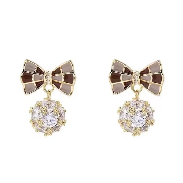 Sophisticated earrings with bow with zircon