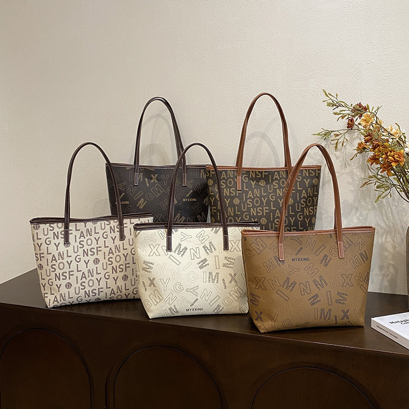 Bolsas de gran capacidad de este año, bolsas de moda populares, bolsas de viaje portátiles de hombro, invierno 2024, nueva marea de letras