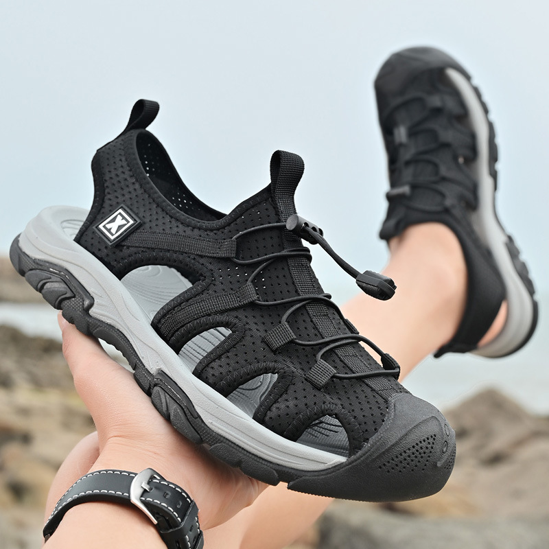 2025 verano baotou sandalias transpirables zapatos de playa al aire libre de tamaño grande tendencia explosiva de comercio exterior zapatos casuales antideslizantes para hombres