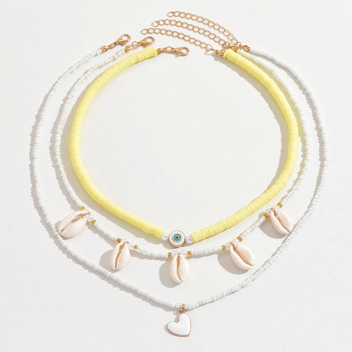 Colar em camadas estilo boho com pingente de coração e concha_voghion.com