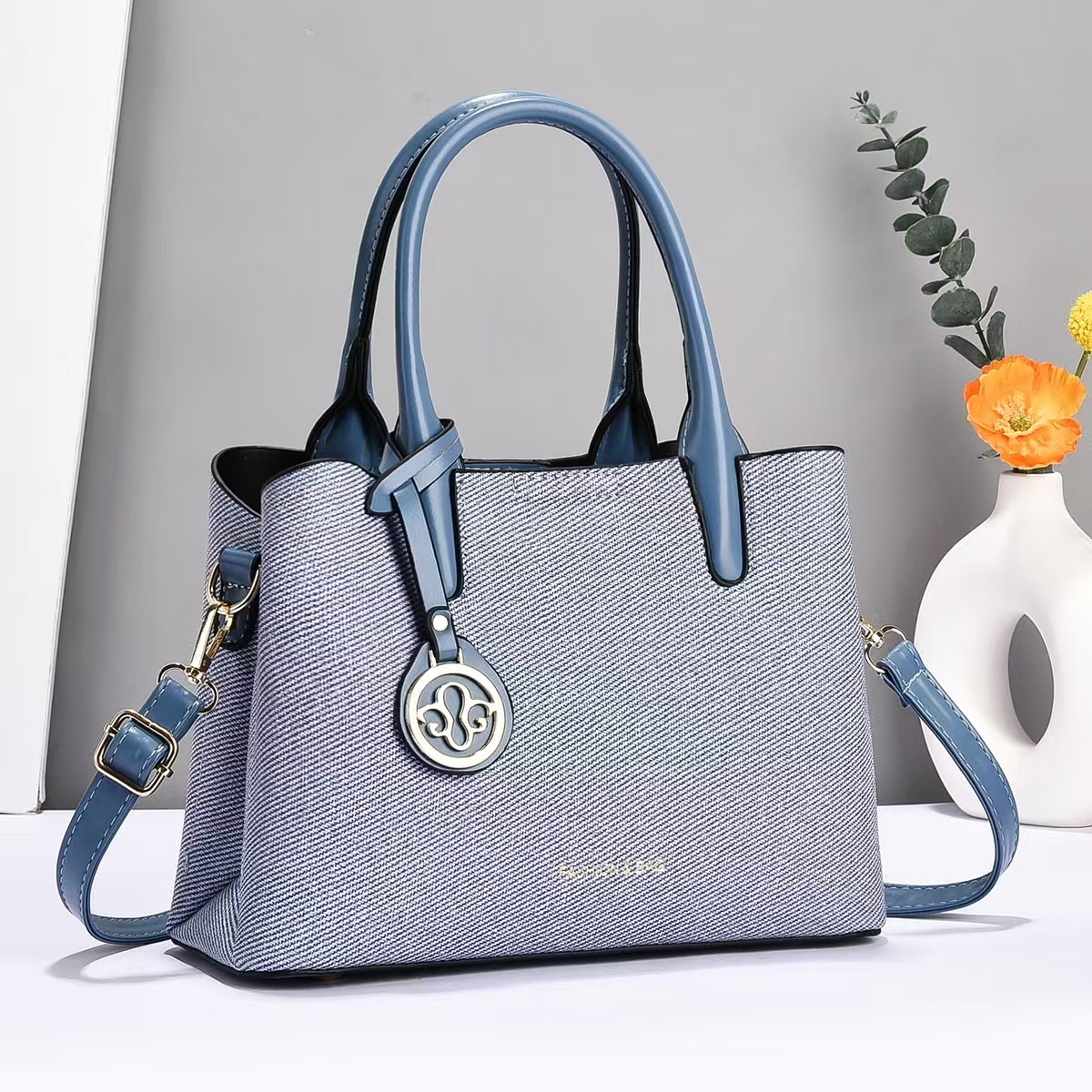 Bolso de mano universal nuevo bolso de hombro de moda bolso de mediana edad bolso de madre bolso de transporte casual bolso de mano