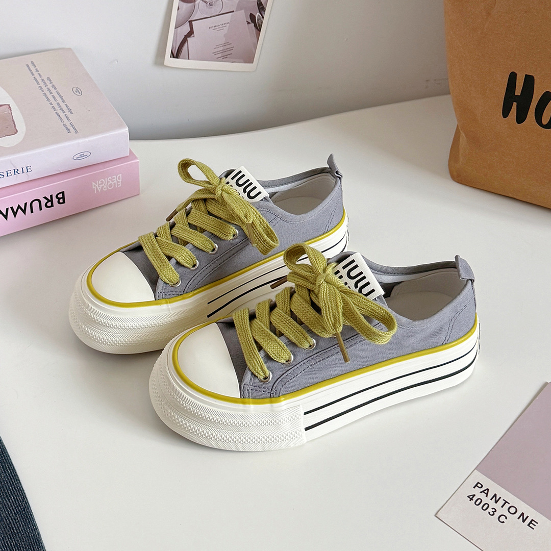 Estilo de Hong Kong nicho zapatos de lona de suela negra y gruesa mujer 2025 nuevos zapatos deportivos de tablero estudiantil h1323 a principios de otoño