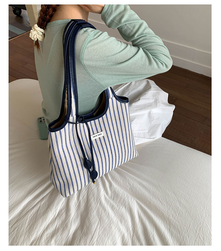 2025 Casual Commuter Tote bag, women's niche striped simple and fashionable hand-held shoulder bag, large-capacity underarm bag undefined
