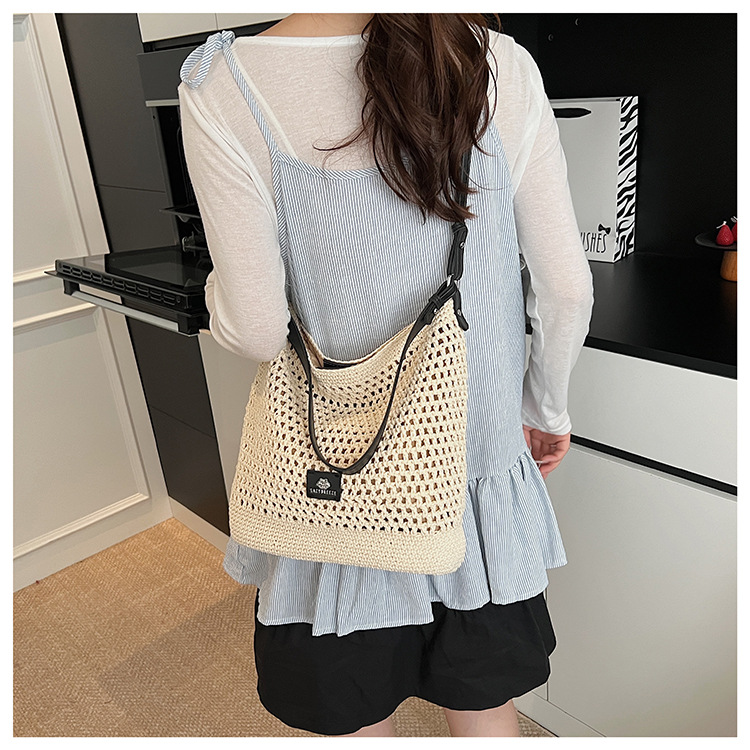 Summer hollowed-out knitted underarm bag for women, 2025 new style, laid-back and relaxed, seaside vacation style single-shoulder crossbody bag undefined