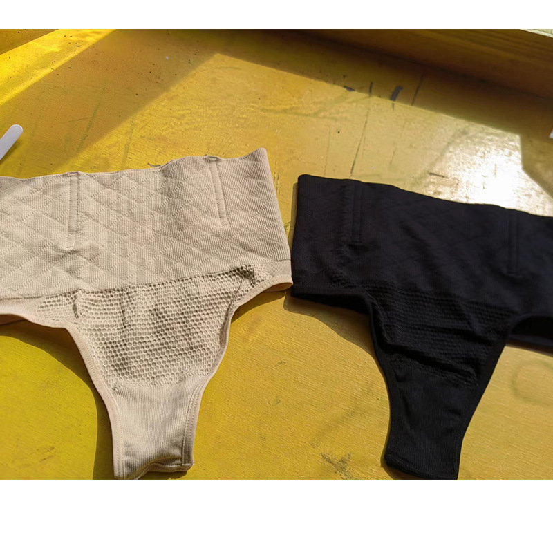 Europa y América sexy cintura media vientre contracción cadera pantalones de elevación sin costuras imitación curling cuerpo de elevación de la cadera pantalones de cintura alta triángulo en forma de t interior