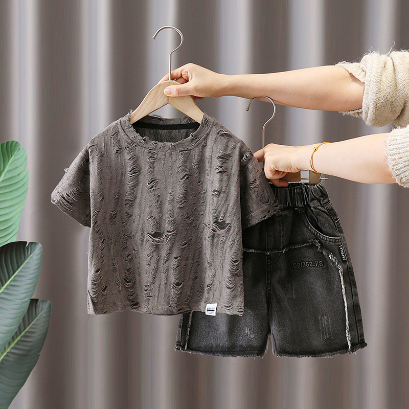 7133 traje de verano para niños ropa coreana de manga corta para niños camiseta hueca de verano pantalones cortos de mezclilla de dos piezas de verano
