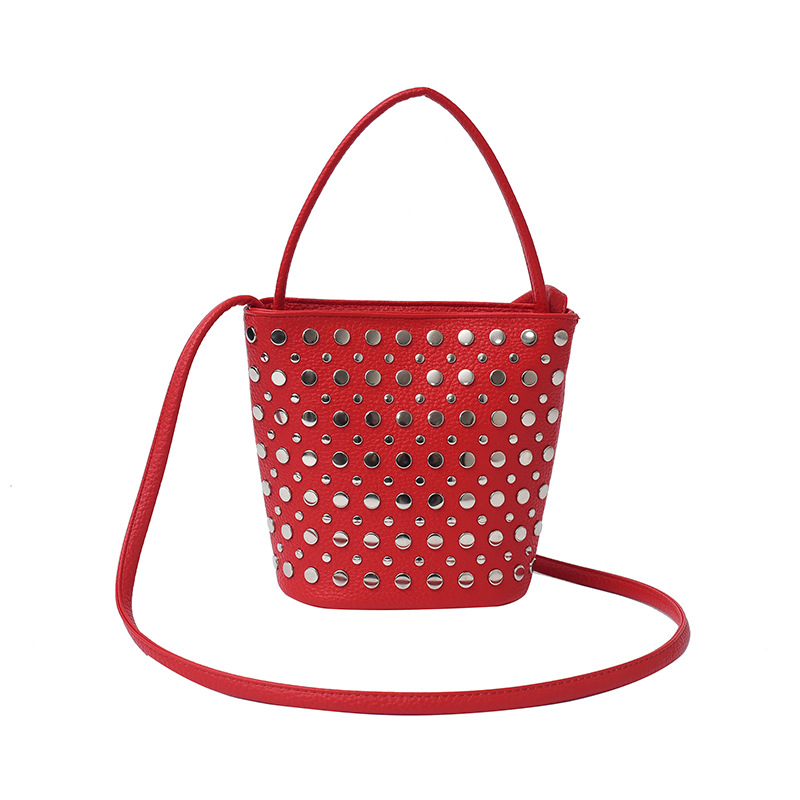 Bolso de cubo de textura transfronteriza 2025 nuevo bolso de mano remache personalizado bolso de hombro retro patrón de lichi bolso de mensajero mujer