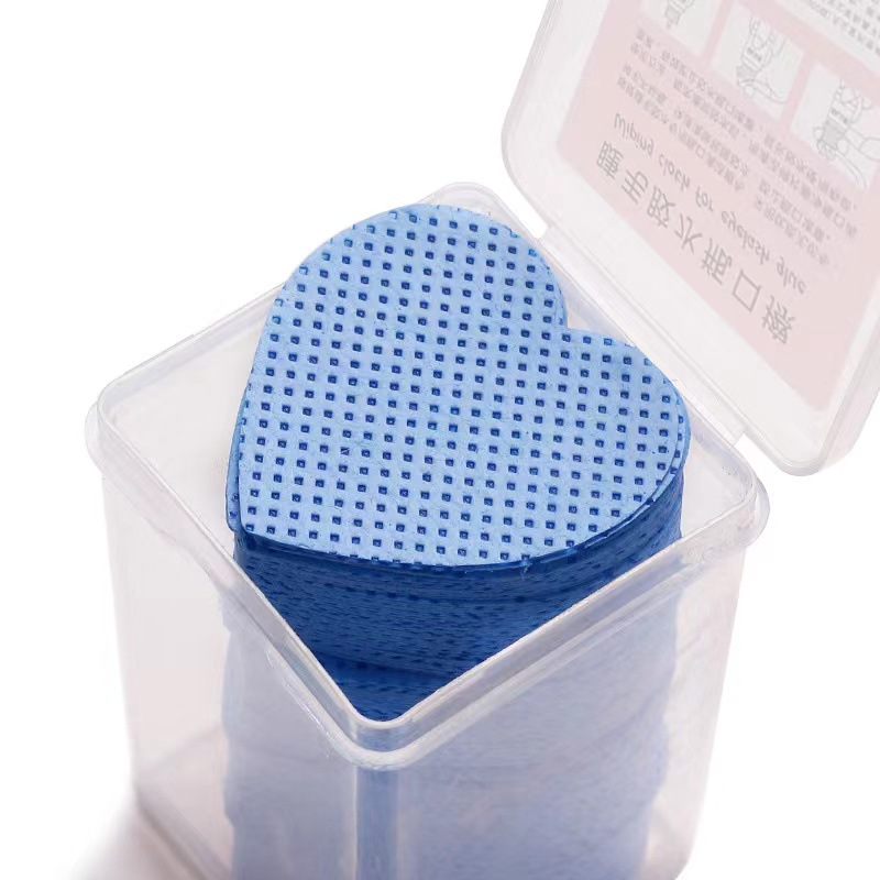 Transfronterizo nuevo pegamento de algodón mágico en forma de corazón Limpieza de pestañas pieza de algodón botella paño de limpieza de boca paño mágico en caja sin pelusa