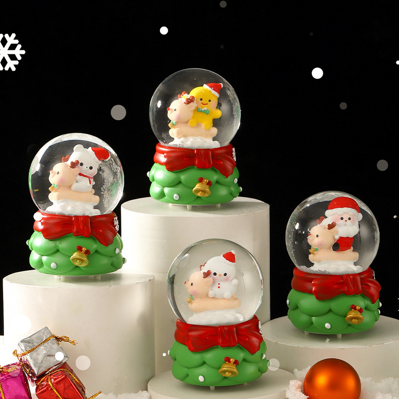 Una variedad de regalos de decoración de Navidad Navidad iluminante bola de cristal caja de música ventana diseño de velas lámparas de viento árbol de Navidad