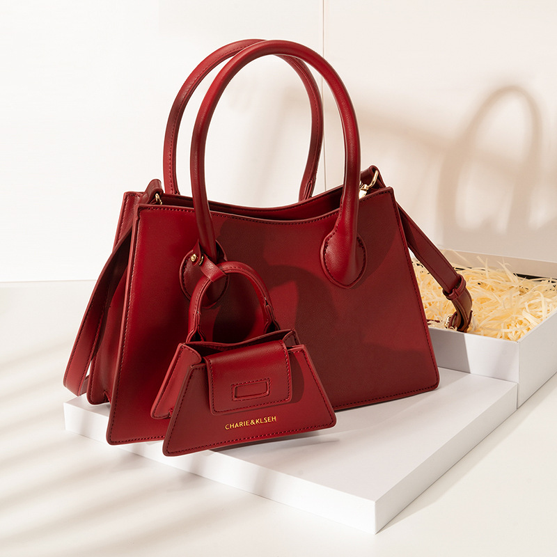 [Two Innocent] Bolso de mano rojo para boda, bolso de gama alta, bolso cruzado para mujer, para ir al trabajo, 2025