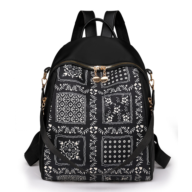 Bolsos para mujer 2023 nueva mochila de nylon para mujer coreana moda salvaje color de contraste mochila de viaje al aire libre al por mayor