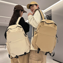 2025新款书包初高中大学生双肩包大容量纯色情侣旅行双肩背包跨境