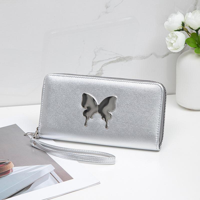 Nicho coreano 2024 mariposa metálica decoración PU material compacto exquisito lindo bolso de mano de mujer