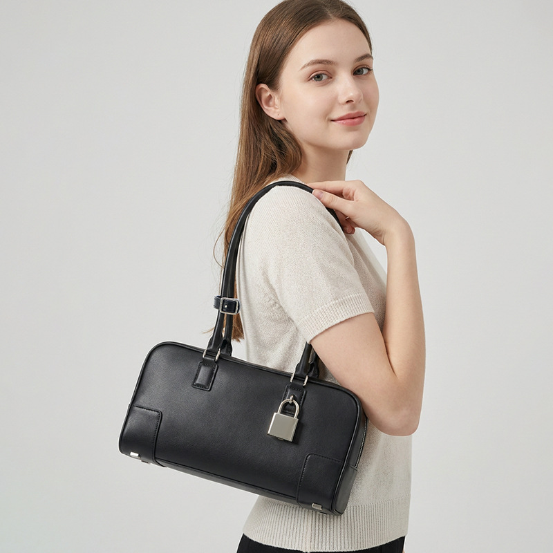 Luxe designertas Niche Luojia Rundleer Onderarmtas voor Dames Europese en Amerikaanse Vintage Bowling Handtas Boston Tas Grote Capaciteit Authentiek_voghion.com