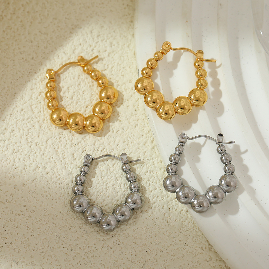 Europa y los Estados Unidos transfronterizos diseño geométrico de alto nivel de nicho de acero inoxidable personalidad de moda orejas