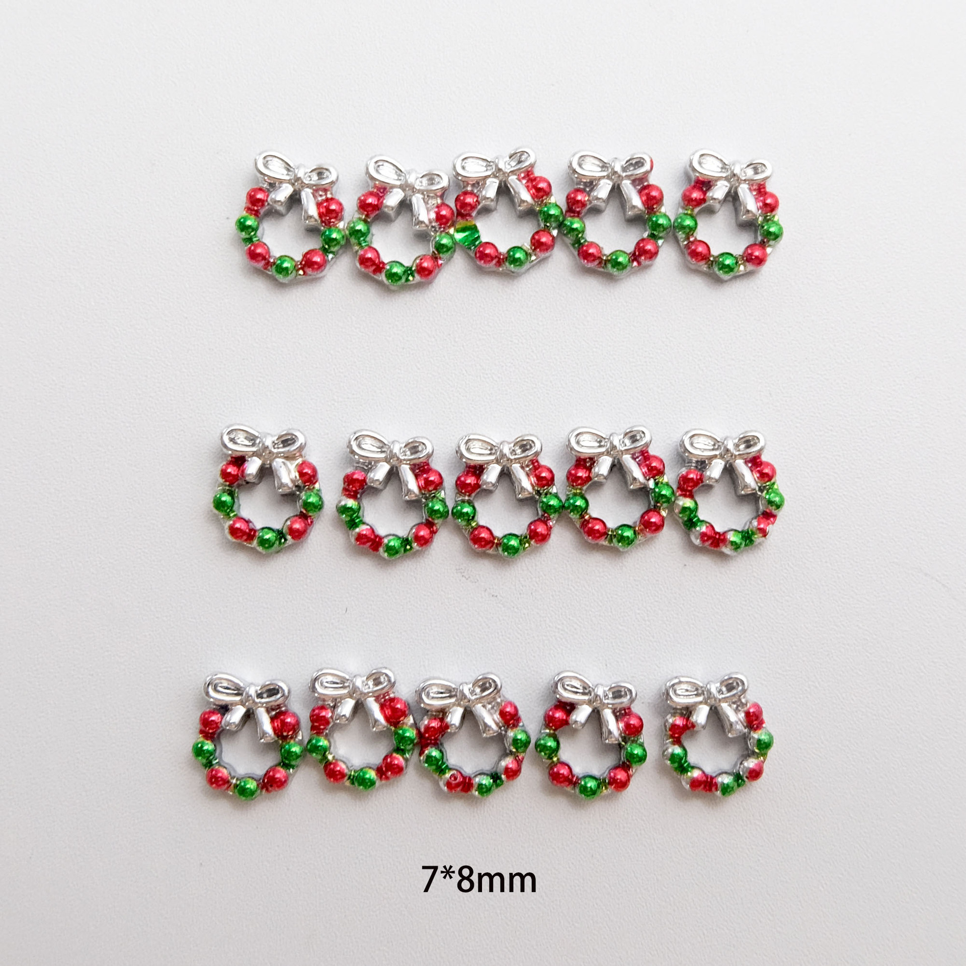 Boxed Christmas wreath nail art decorations, bows, resin colored rhinestones, Christmas wreath nail glitter rhinestones, 7 pieces wholesale
