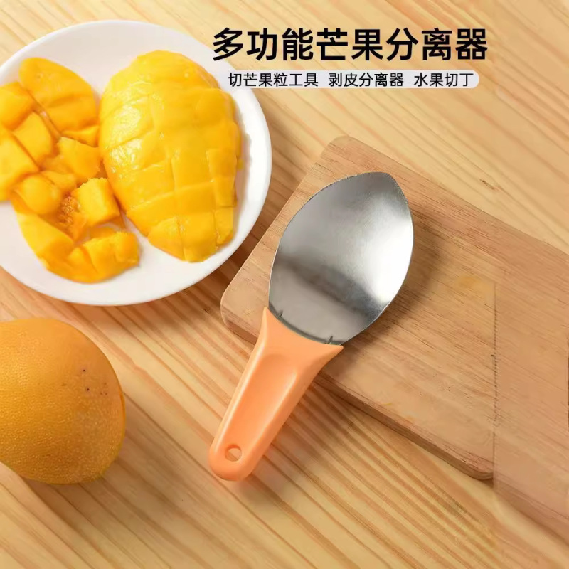 現物ステンレスマンゴー皮むき器果物は肉スプーンを取ってマンゴーを切って皮の果物の核の分離器のマンゴーを切って掘ります。|undefined