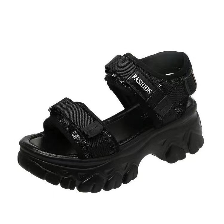 Sandalias de papá de altura de suela gruesa para mujer 2025 verano nuevo estilo coreano de tacón grueso todo-fósforo bizcocho de suela blanda zapatos deportivos de playa