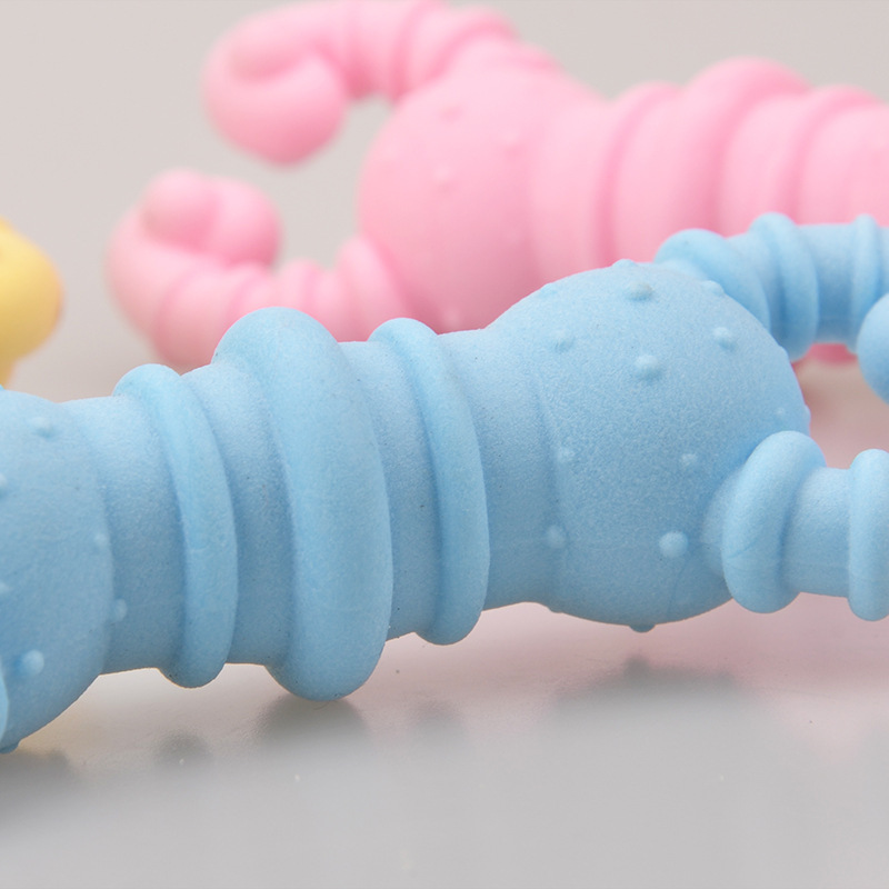 Juguetes para mascotas TPR leche sabor espuma tiras de camarón resistente a mordeduras molar TPR mordedura juguetes para perros en stock al por mayor