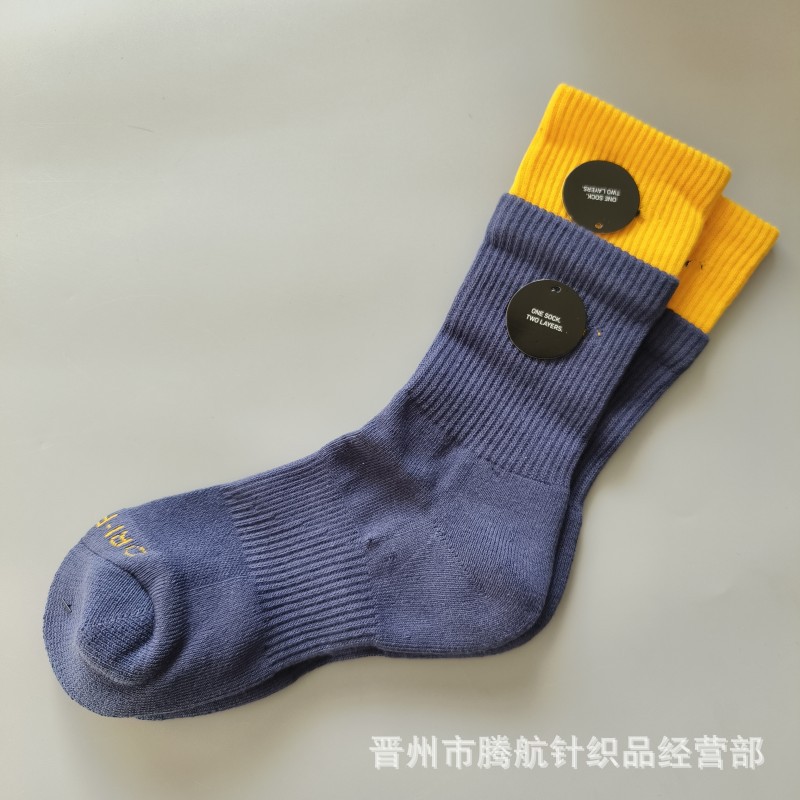 蘇万ナイキの靴下のカラーの二重は男女の中で長い筒のタオルの底のスポーツの靴下をつなぎ合わせてバスケットボールの靴下を走ります。