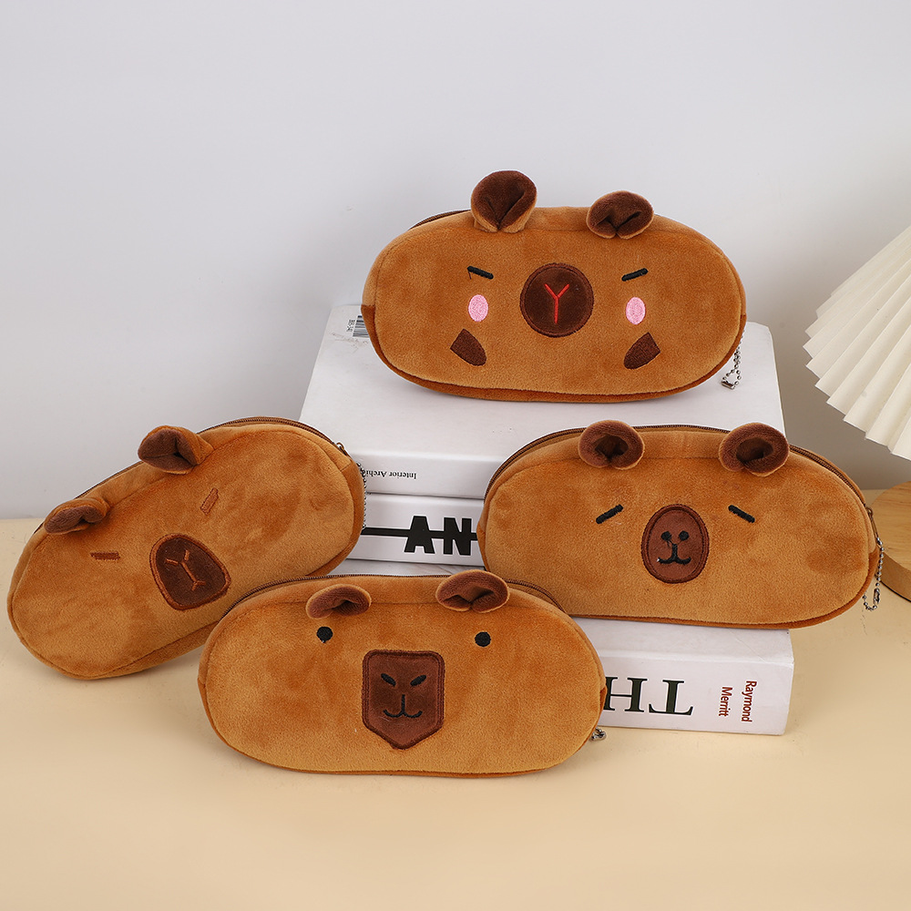 Bolso de lápices de felpa Kapibala de estilo explosivo Bolso de papelería para niños de carpincho de dibujos animados de gran capacidad Bolso de almacenamiento de suministros escolares