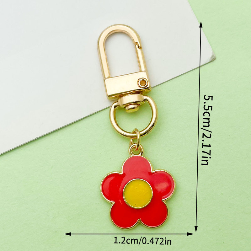 国境を越えた人気の真珠光沢のあるオイルドリップフラワーキーホルダー大きな桜の花びらシンプルなスタイルのUディスクバッグエアポッド小さなペンダント|undefined