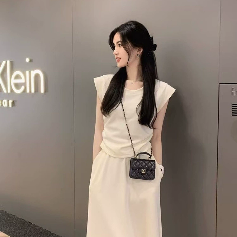 2025 новых летних повседневных топов для стройнящих женщин, элегантный костюм из двух предметов с короткими рукавами и юбкой