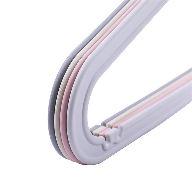Plastic universal white hanger, lifting effect