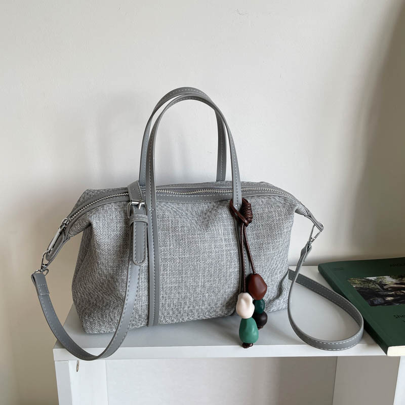 Bolsa de mano de gran capacidad de viaje coreano para mujeres 2026 nueva moda de verano simple bolsa de hombro retro