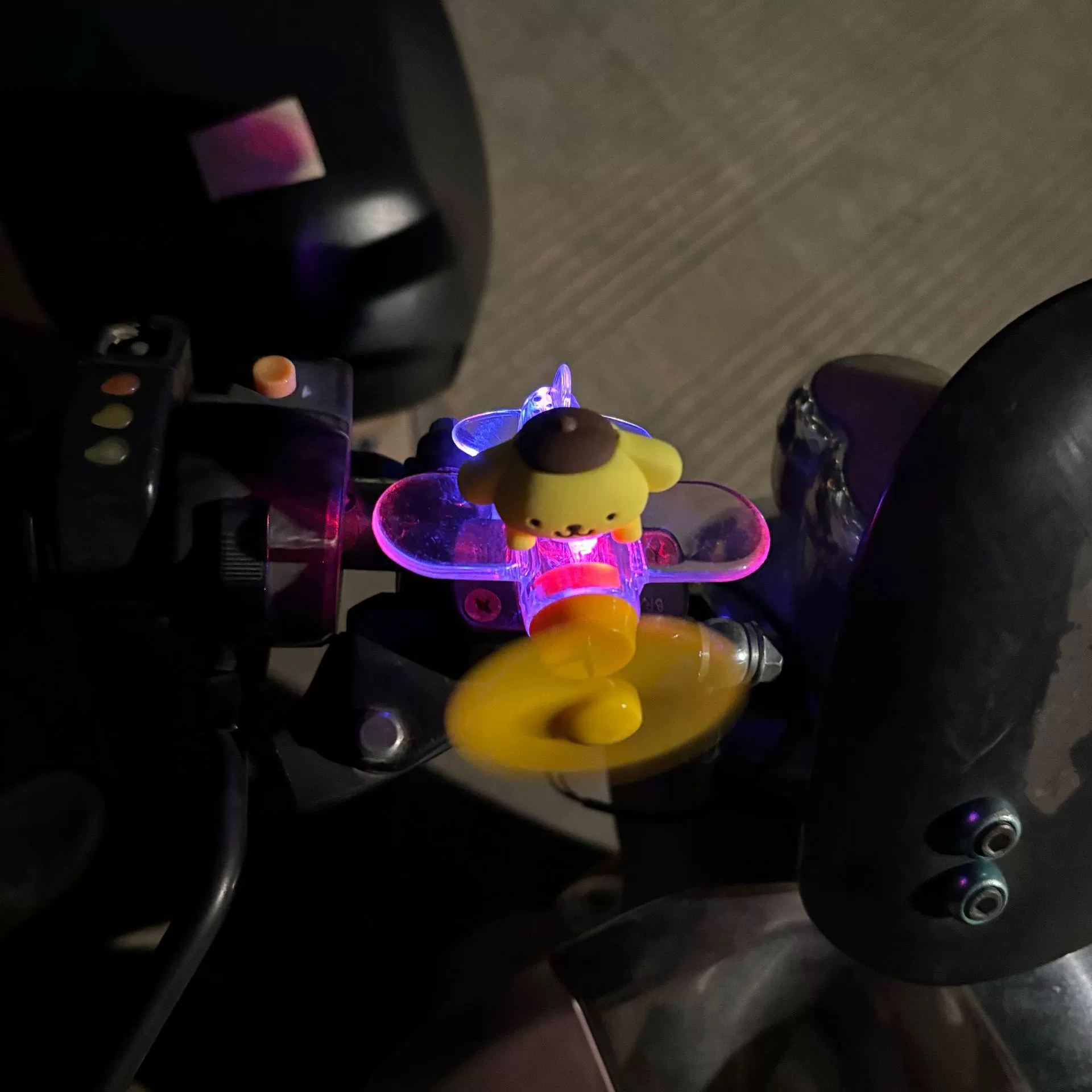 Electric car, glowing airplane, rotating decorations, generating electricity