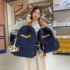 アルファベットのプリントの小さい大衆のかばんのアメリカの復古の大容量のリュックサックの工装の香港の風のブランドの学生はリュックサックを合わせます。
