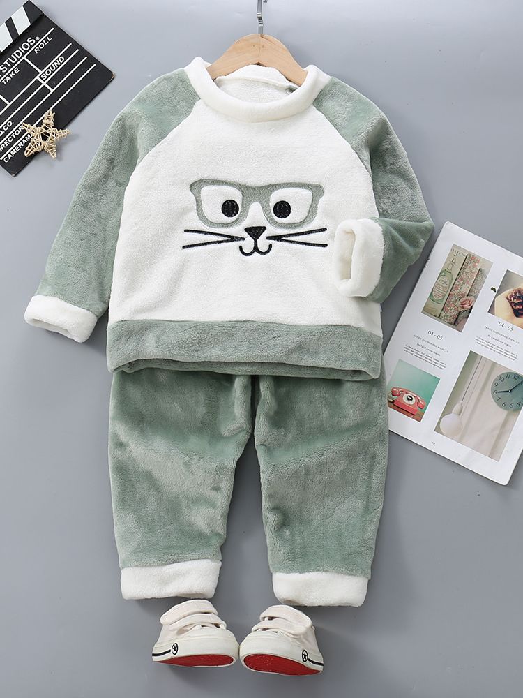 2023 Otoño e Invierno nuevos niños y niñas forrados de lana engrosada cálido traje infantil de dibujos animados franela homewear Pijamas