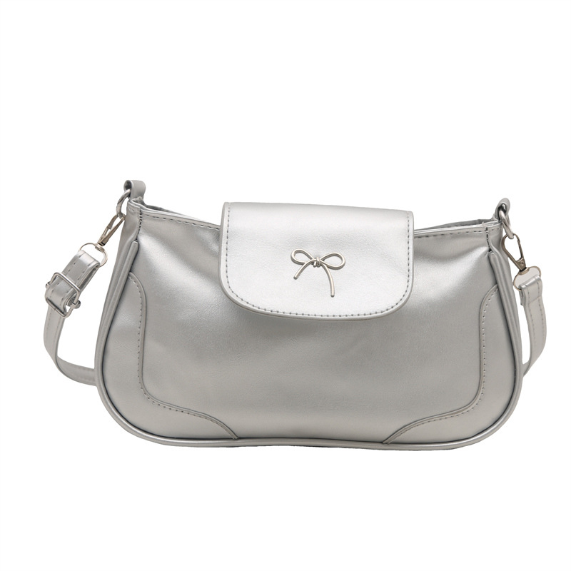 Bolsa de viaje retro para mujeres 2025, nueva moda, bolso de brazo de arco de moda, bolso de brazo elegante y dulce.