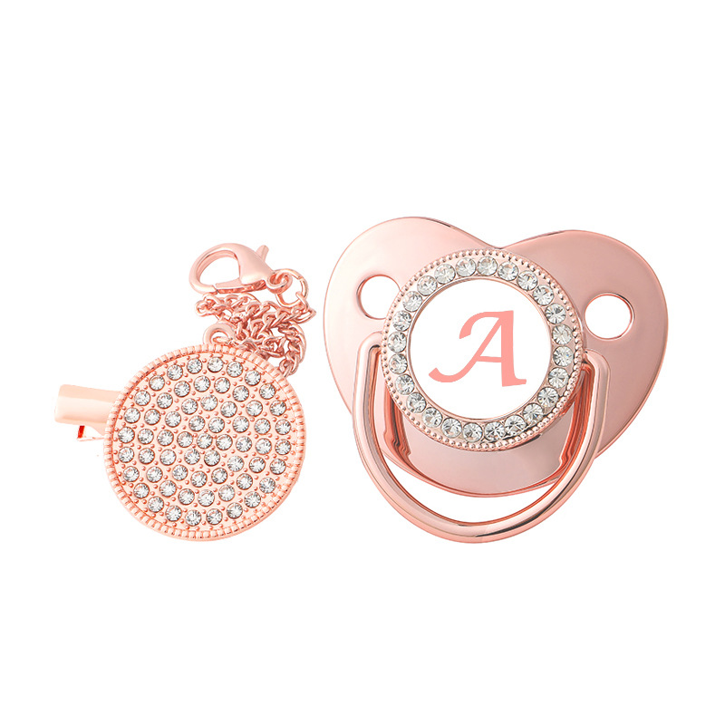 Producto caliente transfronterizo bebé 26 letras de oro rosa calmante pezón destete bebé punto diamante jugar boca con cubierta de polvo