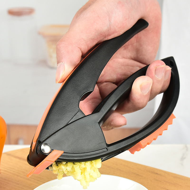 Multifunctional Garlic Press Three-in-one Fruit Peeler Manual Garlic Pounder Meat Flosser Kitchen Tool