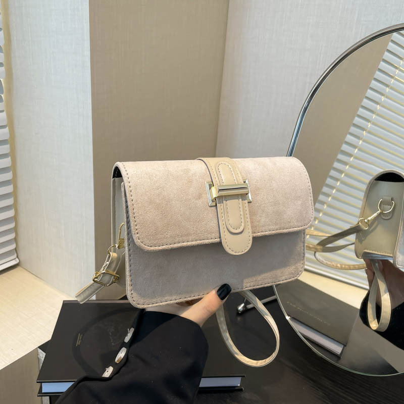 Bolso bandolera de un solo hombro con textura de alta calidad de gamuza de moda coreana 2025 primavera nuevo bolso cuadrado pequeño para el trabajo y los viajeros