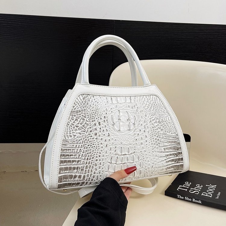 Comercio exterior al por mayor 2023 nuevo estilo retro tendencia bolso de mujer bolso de mensajero de un solo hombro de gran capacidad bolso de color a juego